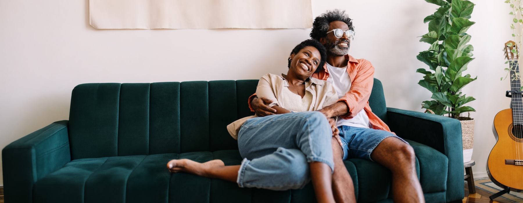 a man and a woman sitting on a couch