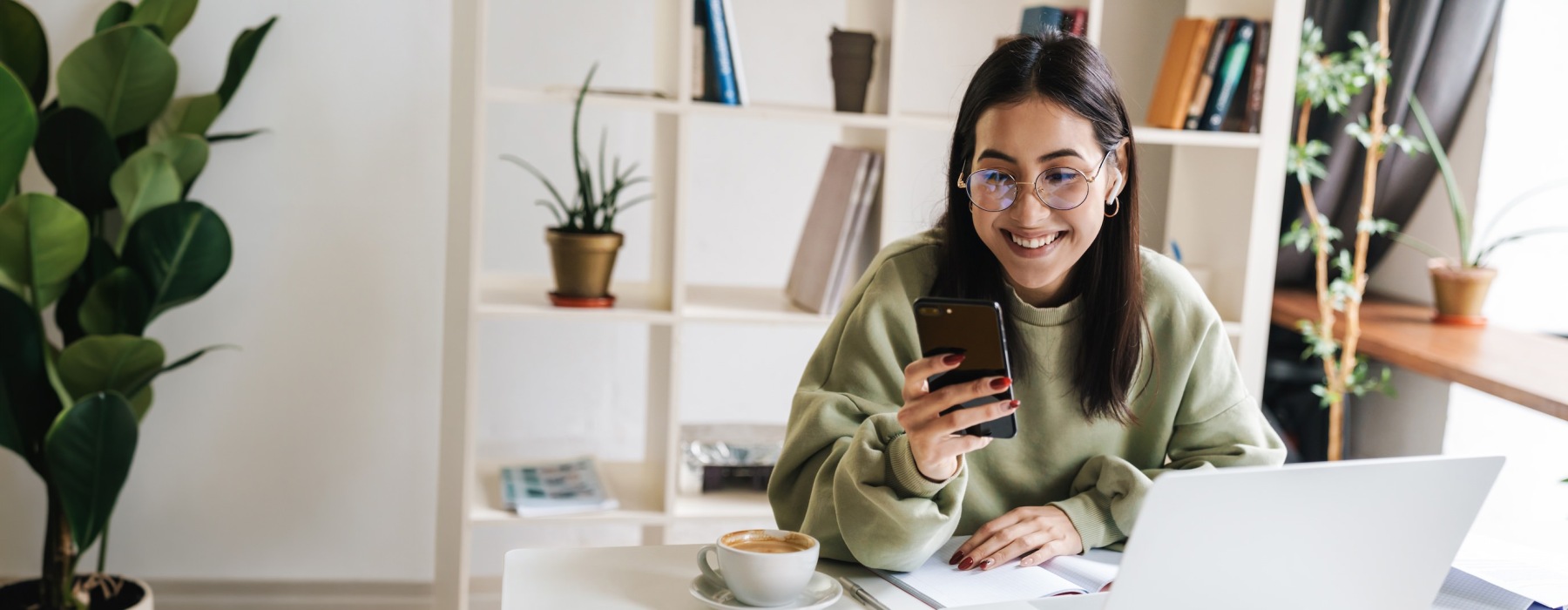 a woman holding a phone
